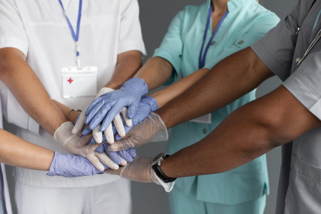 Health workers joining hands