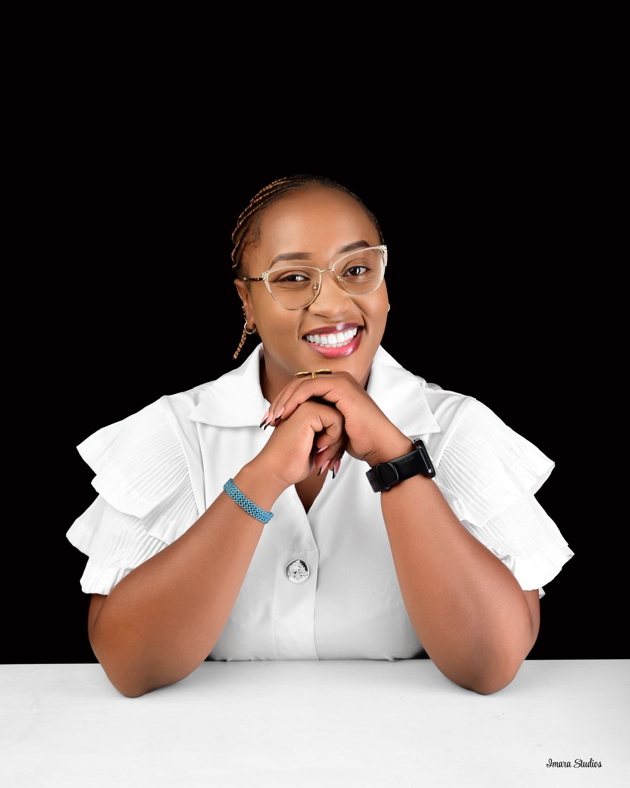 Premac Care founder and CEO in a white top